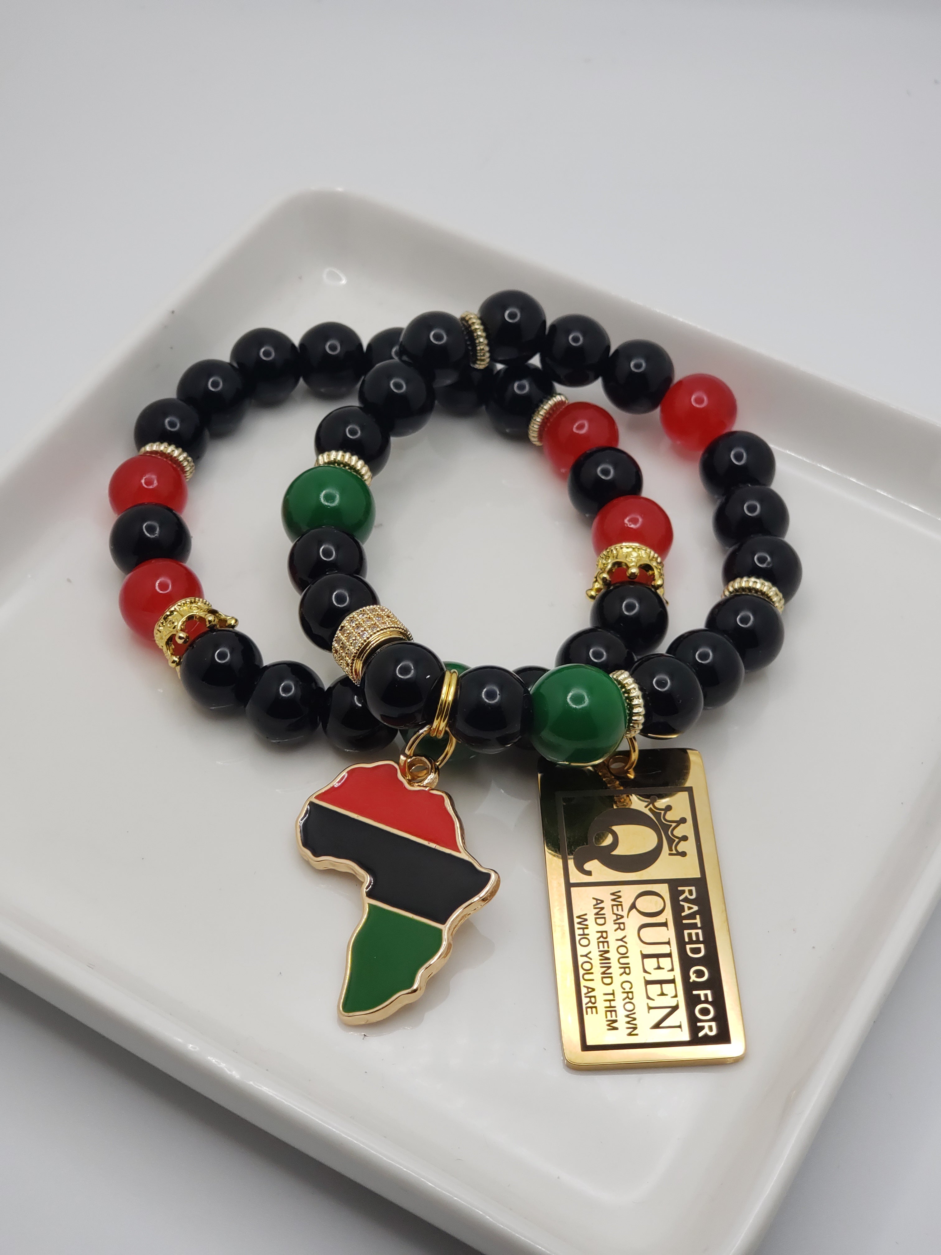 Black/Red/Green Beaded Charm Bracelet with Gold Accents & Africa Charm