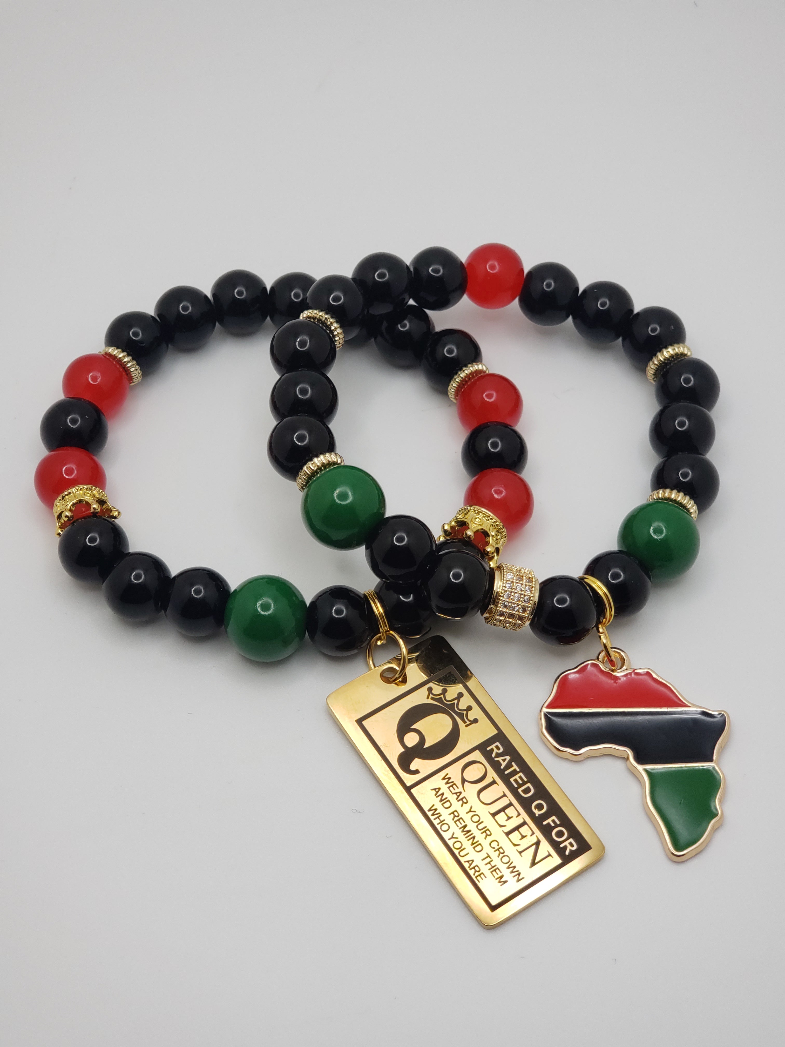 Black/Red/Green Beaded Charm Bracelet with Gold Accents & Africa Charm